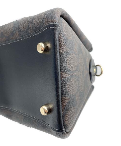 COACH（コーチ）COACH (コーチ) ダーシー キャリーオール・シグネチャー2WAYバッグ ブラウンの古着・服飾アイテム