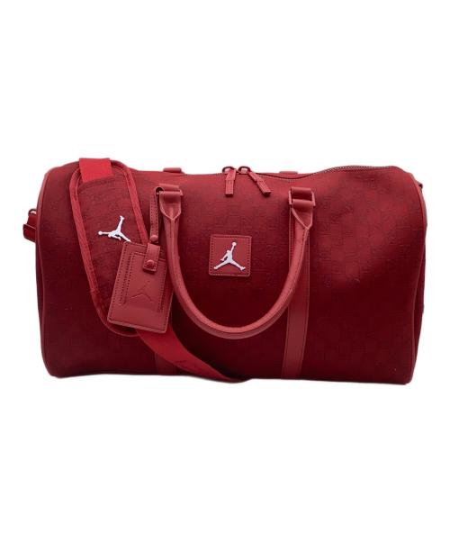 NIKE（ナイキ）NIKE (ナイキ) モノグラムダッフルバッグ レッドの古着・服飾アイテム