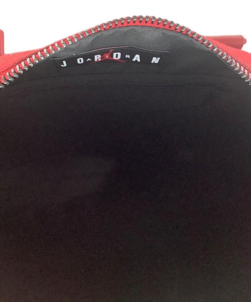 NIKE（ナイキ）NIKE (ナイキ) モノグラムダッフルバッグ レッドの古着・服飾アイテム