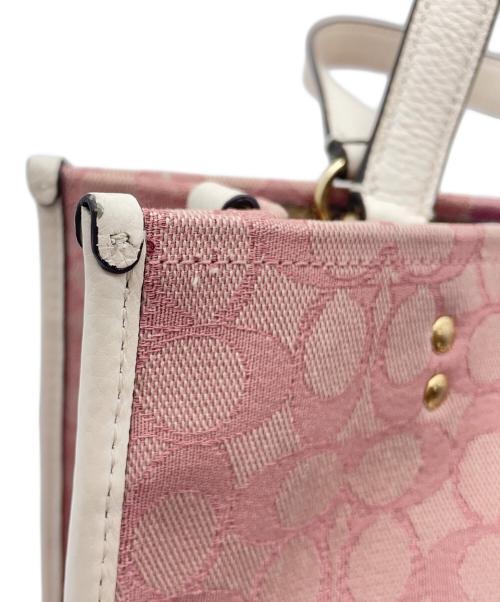 COACH（コーチ）COACH (コーチ) デンプシーキャリーオール 2WAYショルダーバッグ ピンクの古着・服飾アイテム