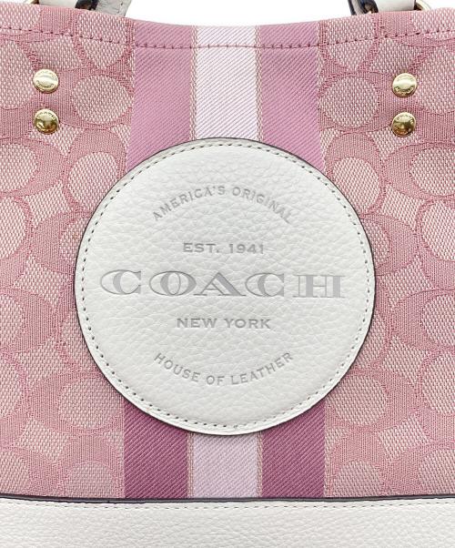 COACH（コーチ）COACH (コーチ) デンプシーキャリーオール 2WAYショルダーバッグ ピンクの古着・服飾アイテム
