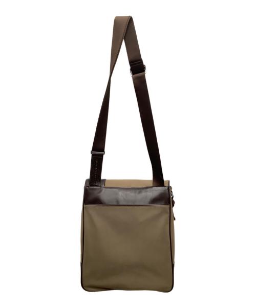 TUMI（トゥミ）TUMI (トゥミ) フラップショルダーバッグ ベージュの古着・服飾アイテム