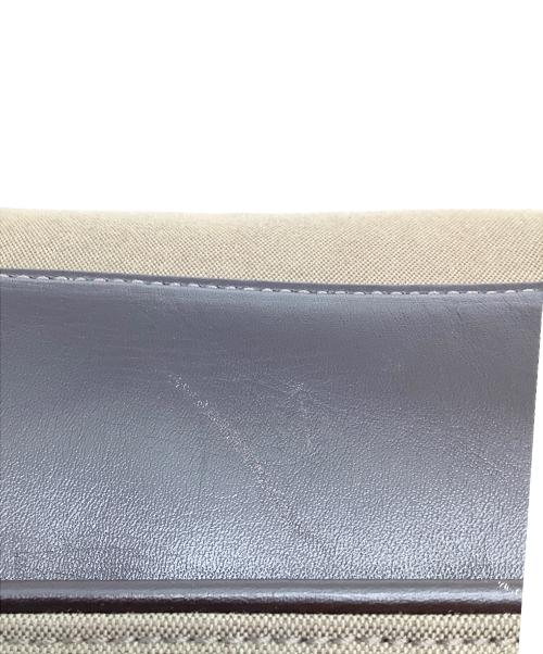 TUMI（トゥミ）TUMI (トゥミ) フラップショルダーバッグ ベージュの古着・服飾アイテム