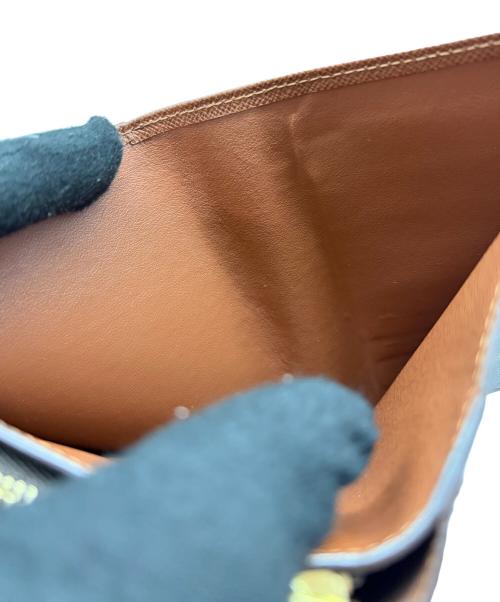 LOUIS VUITTON（ルイ ヴィトン）LOUIS VUITTON (ルイ ヴィトン) 2つ折り財布 モノグラム ポルトパピエ・ジップ ブラウンの古着・服飾アイテム