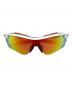 OAKLEY（オークリー）の古着「偏向サングラス」｜ホワイト×オレンジ