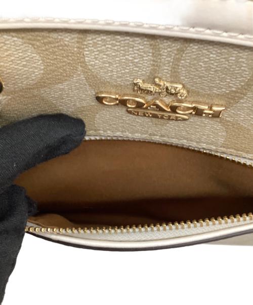 COACH（コーチ）COACH (コーチ)  ローアン サッチェル（Signature Rowan Satchel）　2WAYバッグ ベージュ×ホワイトの古着・服飾アイテム