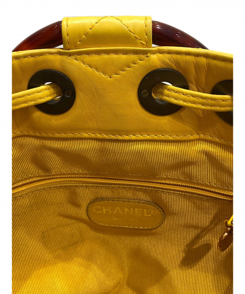 CHANEL（シャネル）CHANEL (シャネル) 巾着ココマークハンドバッグ イエロー サイズ:-の古着・服飾アイテム