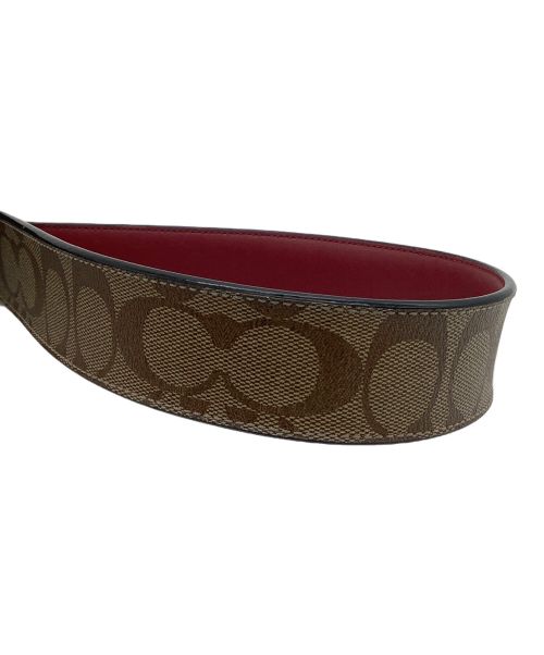 COACH（コーチ）COACH (コーチ) リバーシブルベルト シグネチャー ベージュ×レッドの古着・服飾アイテム