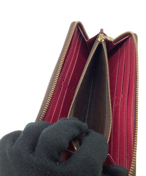 LOUIS VUITTON（ルイ ヴィトン）LOUIS VUITTON (ルイ ヴィトン) 長財布 モノグラム ポルトフォイユ・クレマンス フューシャの古着・服飾アイテム