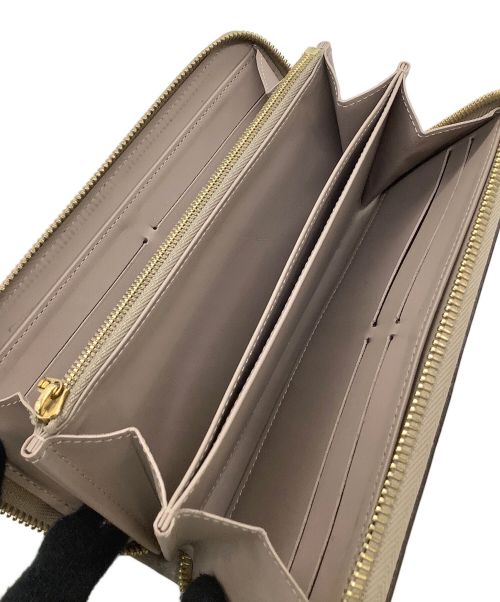 LOUIS VUITTON（ルイ ヴィトン）LOUIS VUITTON (ルイ ヴィトン) ラウンドファスナー財布 ヴェルニ ジッピー ウォレット ベージュプードルの古着・服飾アイテム