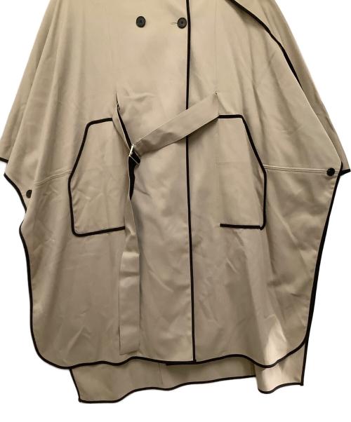 UNITED TOKYO（ユナイテッドトーキョー）UNITED TOKYO (ユナイテッドトーキョー) オブリークカッティングケープコート ベージュの古着・服飾アイテム