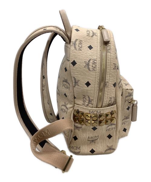 MCM（エムシーエム）MCM (エムシーエム) リュック サイドスタッズバックパック ベージュの古着・服飾アイテム