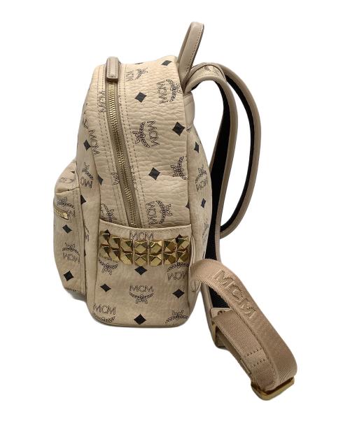MCM（エムシーエム）MCM (エムシーエム) リュック サイドスタッズバックパック ベージュの古着・服飾アイテム