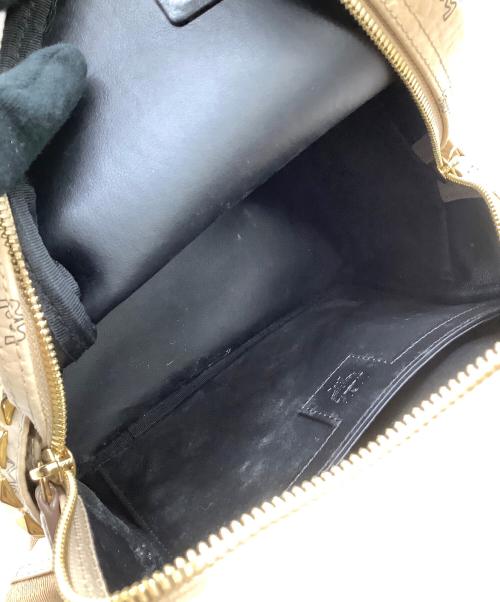 MCM（エムシーエム）MCM (エムシーエム) リュック サイドスタッズバックパック ベージュの古着・服飾アイテム