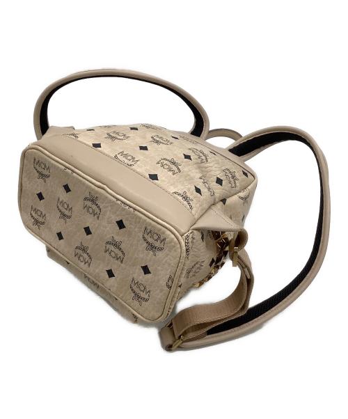 MCM（エムシーエム）MCM (エムシーエム) リュック サイドスタッズバックパック ベージュの古着・服飾アイテム