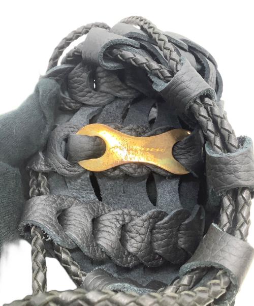 il micio（イル ミーチョ）il micio (イル ミーチョ) ドローストリングポーチ ブラックの古着・服飾アイテム