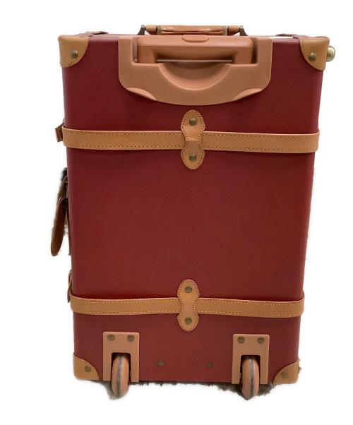 world trunk（ワールドトランク）world trunk (ワールドトランク) キャリーバッグ レッド×ブラウンの古着・服飾アイテム