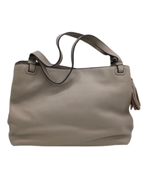 TORY BURCH（トリーバーチ）TORY BURCH (トリーバーチ) トートバッグ タッセル付 エンボスロゴ ベージュの古着・服飾アイテム