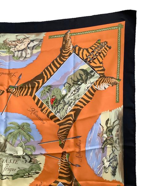 HERMES（エルメス）HERMES (エルメス) 大判スカーフ カレ90/La Chasse en Afrique オレンジ×ブラックの古着・服飾アイテム