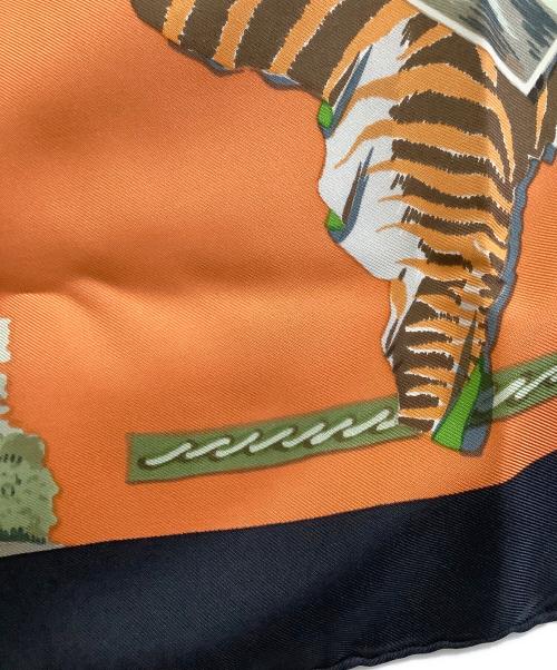 HERMES（エルメス）HERMES (エルメス) 大判スカーフ カレ90/La Chasse en Afrique オレンジ×ブラックの古着・服飾アイテム