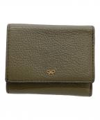 ANYA HINDMARCHアニヤ・ハインドマーチ）の古着「コンパクトウォレット」｜カーキ
