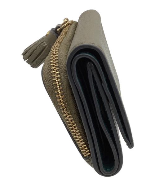 ANYA HINDMARCH（アニヤ・ハインドマーチ）ANYA HINDMARCH (アニヤ・ハインドマーチ) コンパクトウォレット カーキの古着・服飾アイテム