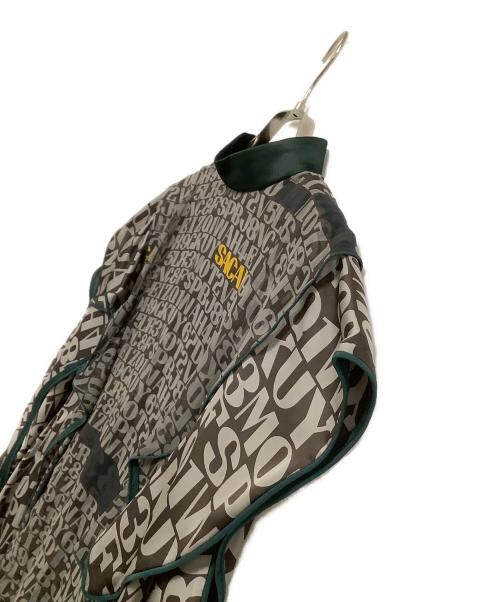 sacai（サカイ）sacai (サカイ) 半袖ブラウス　数字×ローマ字模様 ブラウン×グリーン サイズ:3の古着・服飾アイテム