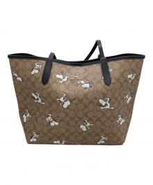 COACH（コーチ）の古着「トートバッグ　シグネチャー　スヌーピー　」｜ベージュ×ブラック