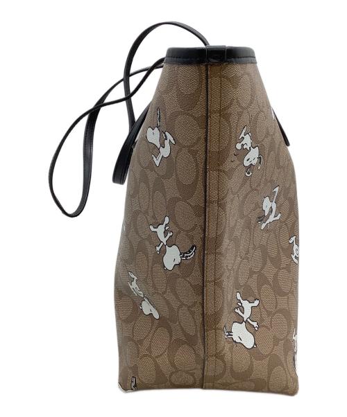 COACH（コーチ）COACH (コーチ) トートバッグ　シグネチャー　スヌーピー　 ベージュ×ブラックの古着・服飾アイテム