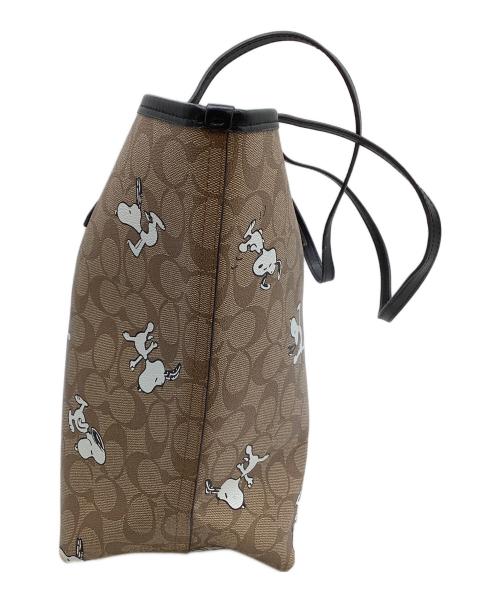 COACH（コーチ）COACH (コーチ) トートバッグ　シグネチャー　スヌーピー　 ベージュ×ブラックの古着・服飾アイテム