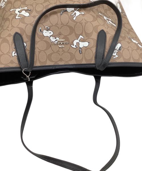 COACH（コーチ）COACH (コーチ) トートバッグ　シグネチャー　スヌーピー　 ベージュ×ブラックの古着・服飾アイテム