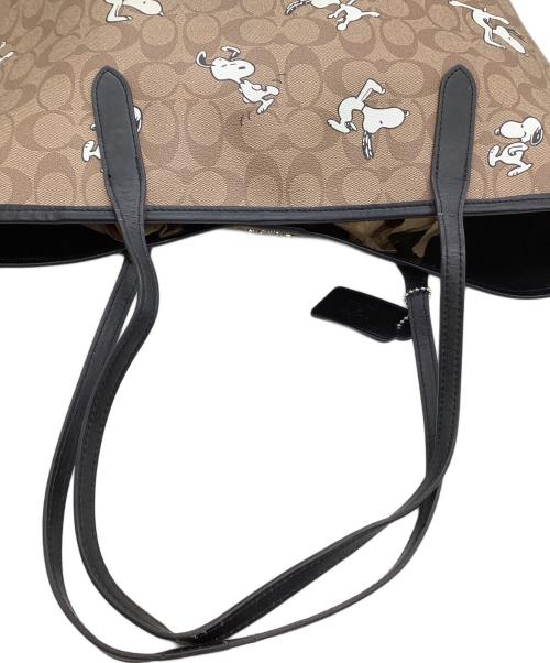 COACH（コーチ）COACH (コーチ) トートバッグ　シグネチャー　スヌーピー　 ベージュ×ブラックの古着・服飾アイテム