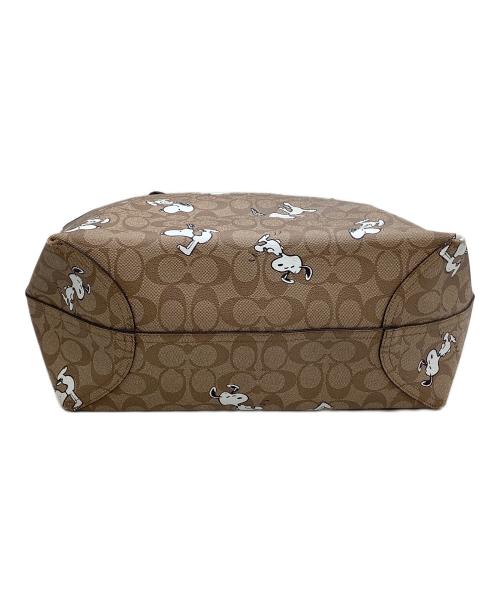 COACH（コーチ）COACH (コーチ) トートバッグ　シグネチャー　スヌーピー　 ベージュ×ブラックの古着・服飾アイテム
