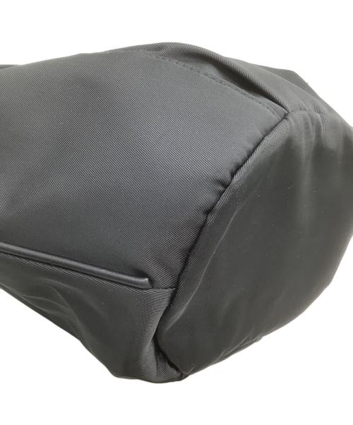 ear PAPILLONNER（イアパピヨネ）ear PAPILLONNER (イアパピヨネ) 2WAYバッグ　アジャスタートートバッグSサイズ ブラック×ホワイトの古着・服飾アイテム