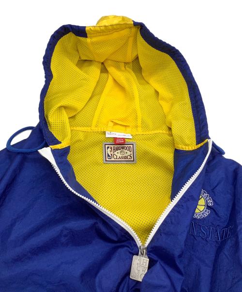 MITCHELL & NESS（ミッチェルアンドネス）MITCHELL & NESS (ミッチェルアンドネス) アノラックパーカー　warriors  ブルー サイズ:Mの古着・服飾アイテム