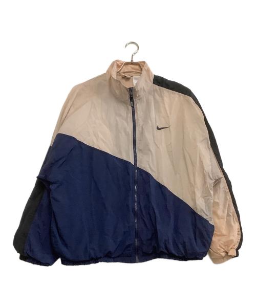 NIKE（ナイキ）NIKE (ナイキ) ナイロンジャケット　銀タグ ベージュ×ネイビー サイズ:XLの古着・服飾アイテム