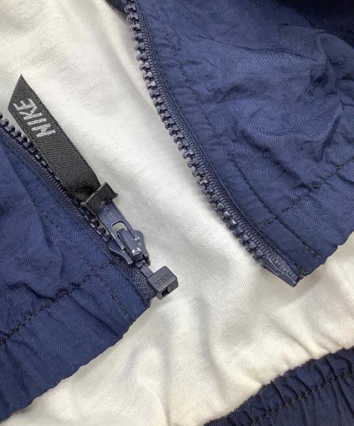 NIKE（ナイキ）NIKE (ナイキ) ナイロンジャケット　銀タグ ベージュ×ネイビー サイズ:XLの古着・服飾アイテム