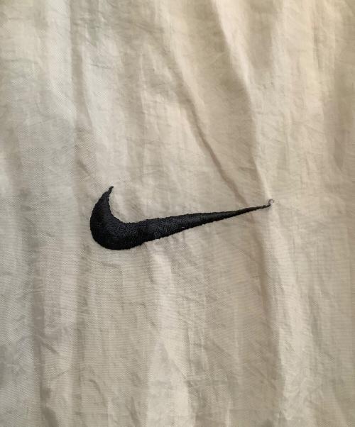 NIKE（ナイキ）NIKE (ナイキ) ナイロンジャケット　銀タグ ベージュ×ネイビー サイズ:XLの古着・服飾アイテム