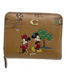 COACH×DISNEY（コーチ×ディズニー）の古着「ラウンドファスナー財布 ビルフォールド ウォレット / ミッキー＆フレンズ」｜ブラウン
