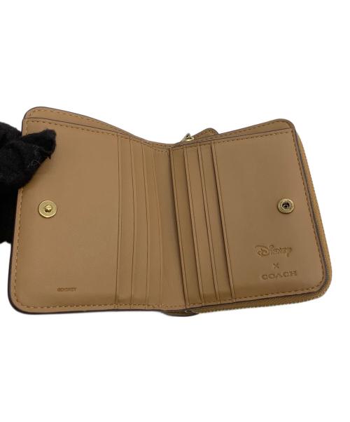 COACH（コーチ）COACH (コーチ) DISNEY (ディズニー) ラウンドファスナー財布 ビルフォールド ウォレット / ミッキー＆フレンズ ブラウンの古着・服飾アイテム