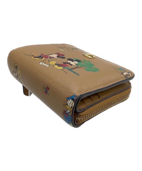 COACH（コーチ）COACH (コーチ) DISNEY (ディズニー) ラウンドファスナー財布 ビルフォールド ウォレット / ミッキー＆フレンズ ブラウンの古着・服飾アイテム
