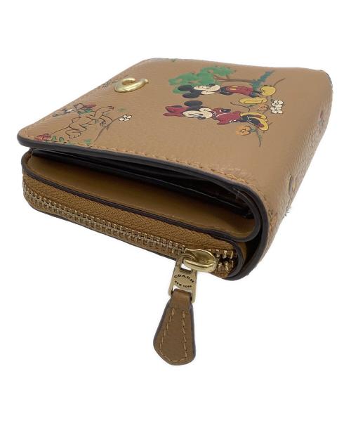COACH（コーチ）COACH (コーチ) DISNEY (ディズニー) ラウンドファスナー財布 ビルフォールド ウォレット / ミッキー＆フレンズ ブラウンの古着・服飾アイテム