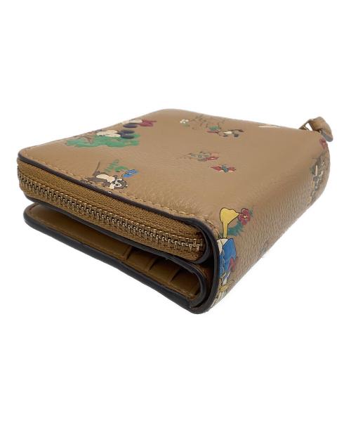 COACH（コーチ）COACH (コーチ) DISNEY (ディズニー) ラウンドファスナー財布 ビルフォールド ウォレット / ミッキー＆フレンズ ブラウンの古着・服飾アイテム