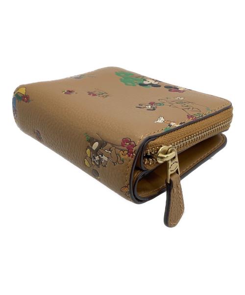 COACH（コーチ）COACH (コーチ) DISNEY (ディズニー) ラウンドファスナー財布 ビルフォールド ウォレット / ミッキー＆フレンズ ブラウンの古着・服飾アイテム