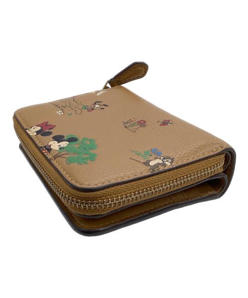 COACH（コーチ）COACH (コーチ) DISNEY (ディズニー) ラウンドファスナー財布 ビルフォールド ウォレット / ミッキー＆フレンズ ブラウンの古着・服飾アイテム