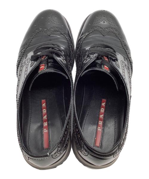 PRADA（プラダ）PRADA (プラダ) ウィングチップシューズ メダリオン ブラック サイズ: 6 1/2の古着・服飾アイテム
