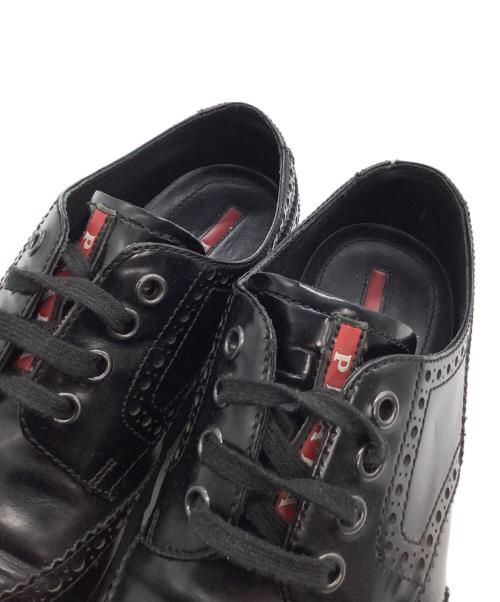 PRADA（プラダ）PRADA (プラダ) ウィングチップシューズ メダリオン ブラック サイズ: 6 1/2の古着・服飾アイテム