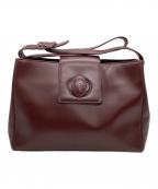 Cartierカルティエ）の古着「ショルダーバッグ　ターンロック」｜ボルドー