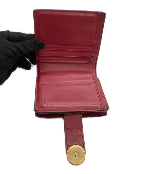 FENDI（フェンディ）FENDI (フェンディ) 2つ折り財布 エフイズ ブラウン×レッドの古着・服飾アイテム