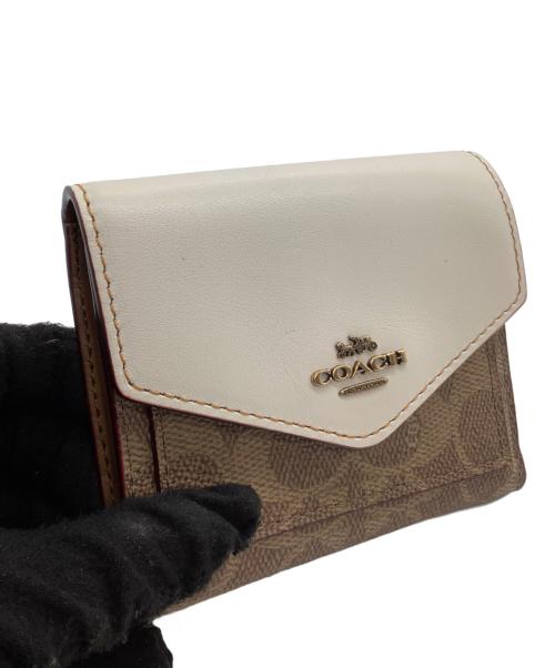 COACH（コーチ）COACH (コーチ) 2つ折り財布 ホワイト×ベージュの古着・服飾アイテム